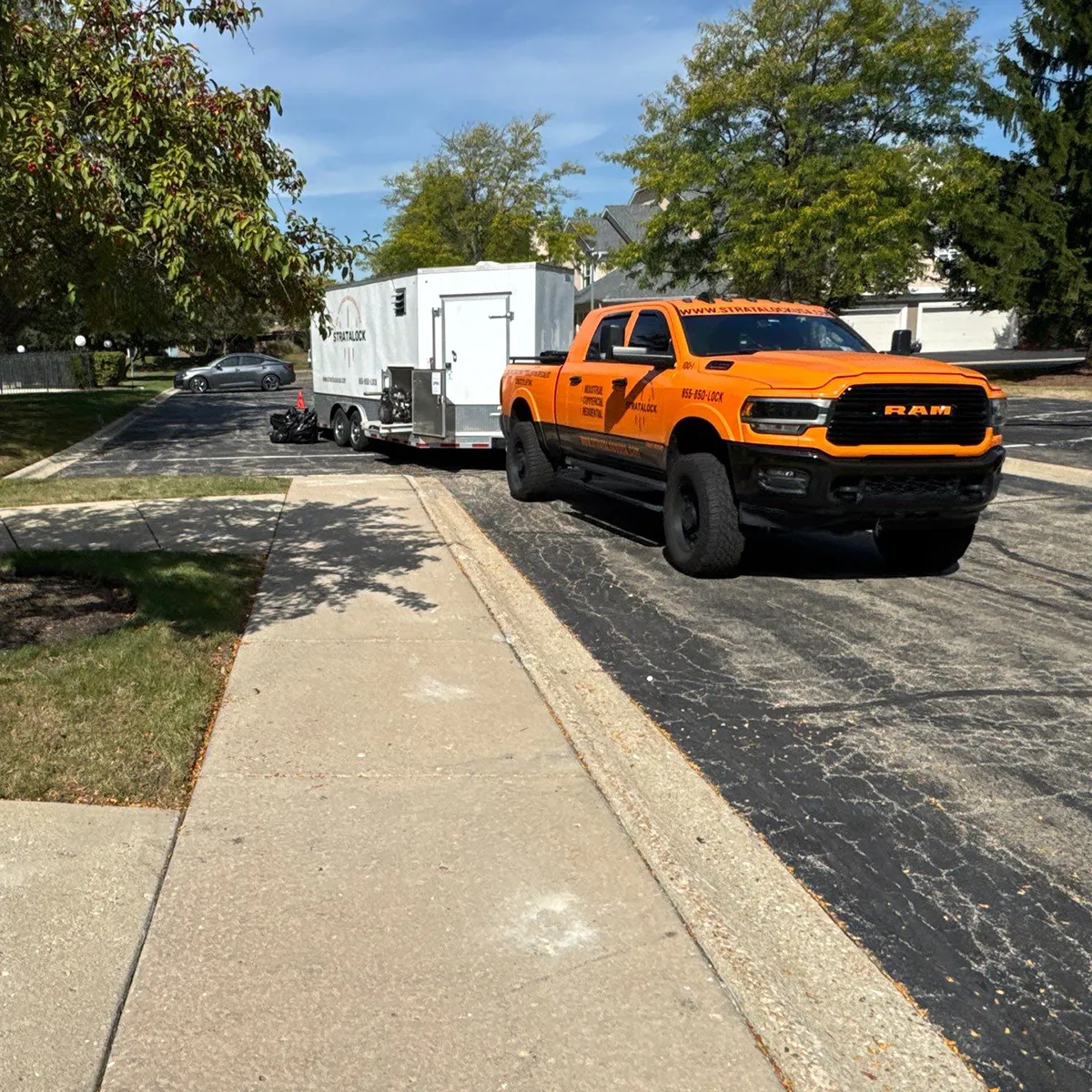Stratalock orange truck on construction job site