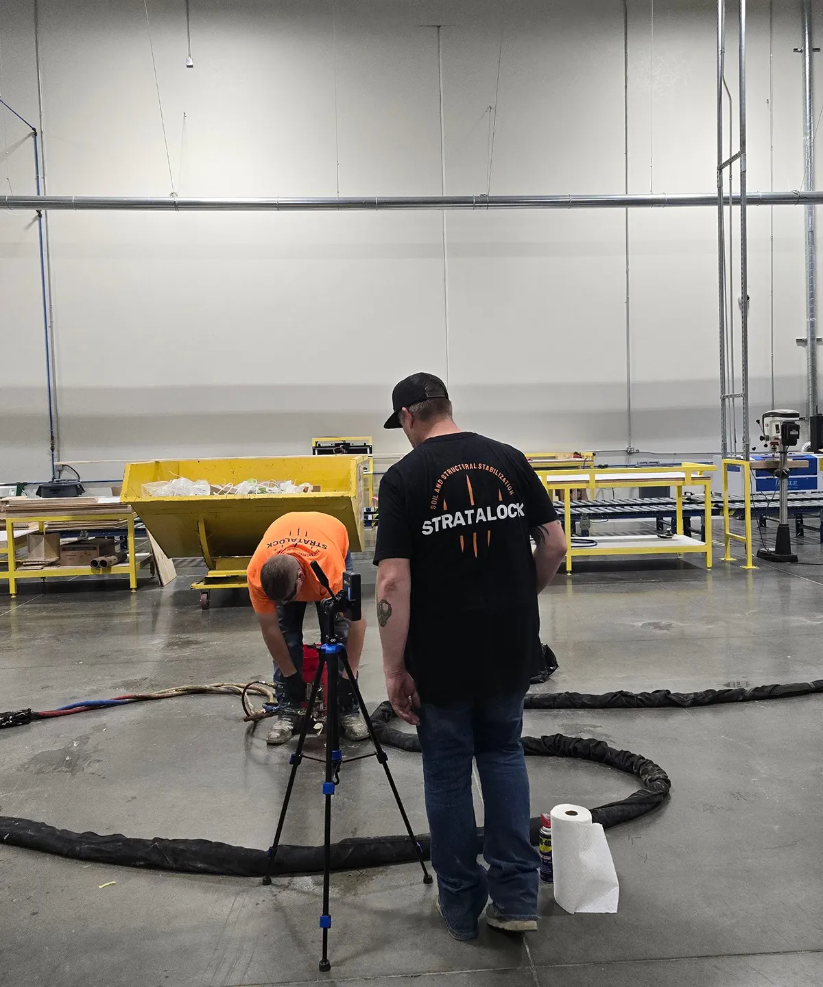 Stratalock team performing deep soil injection